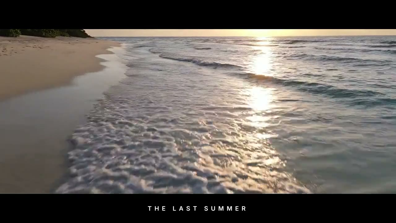 The same shoreline letterboxed, THE LAST SUMMER fading in across the bottom bar