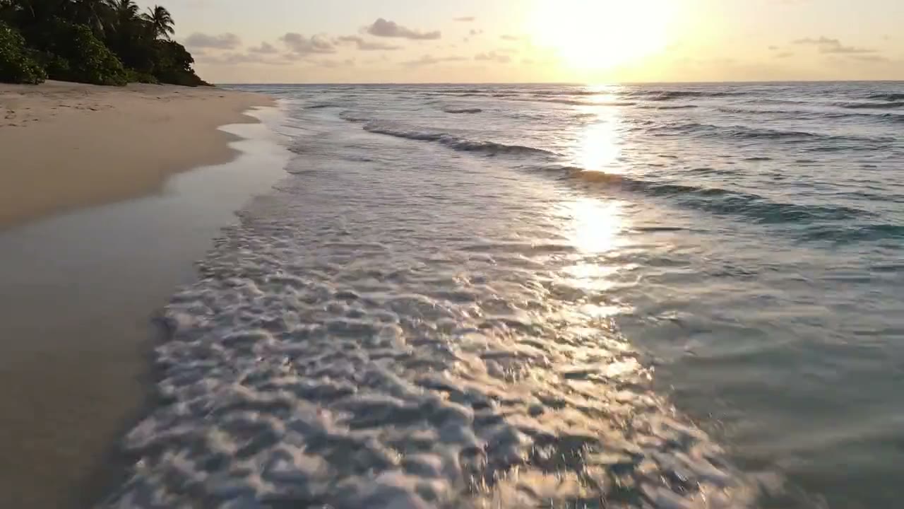 An aerial pass over a shoreline at sunset, as the clip came out of the model