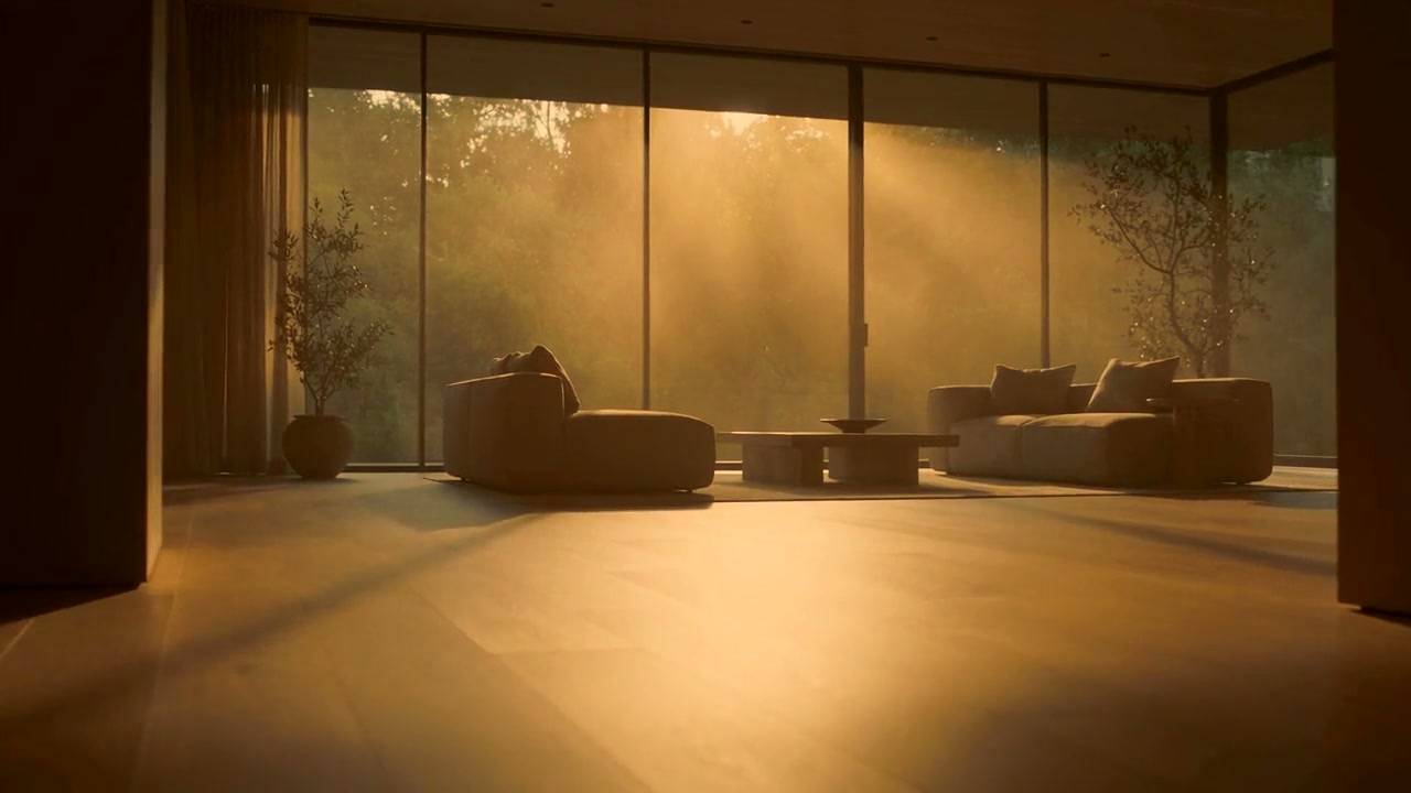 A sunlit living room warmed to amber light